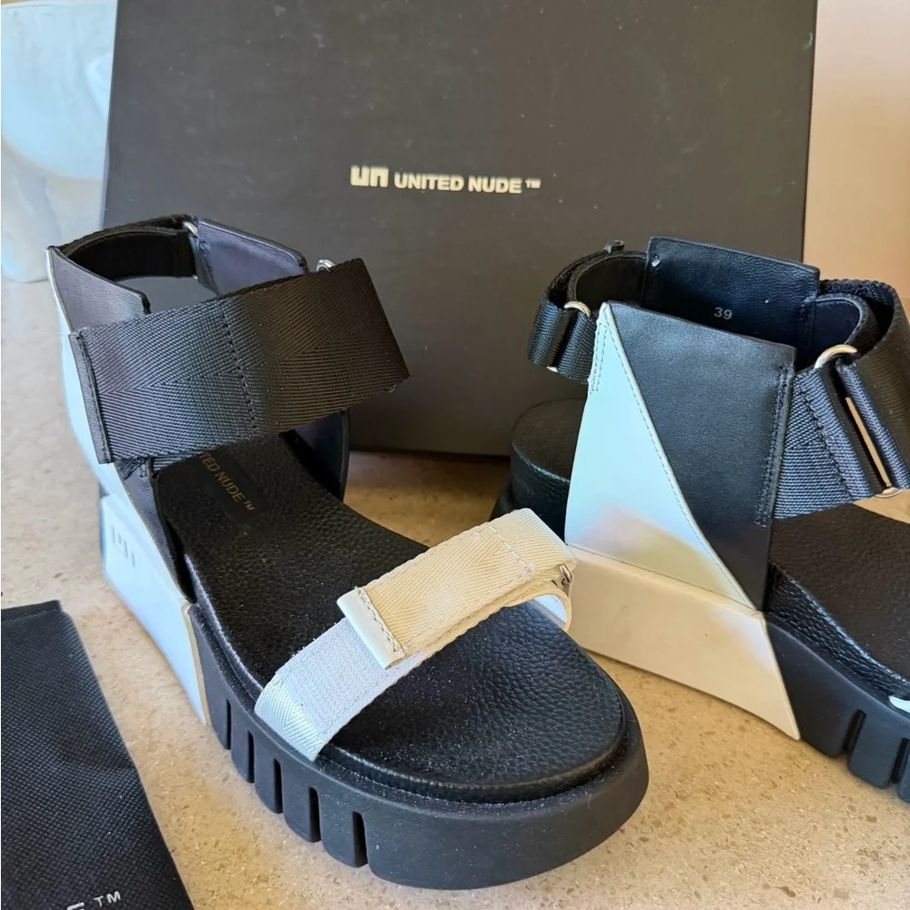 Very cool United Nude size 39 black and white platform shoes.